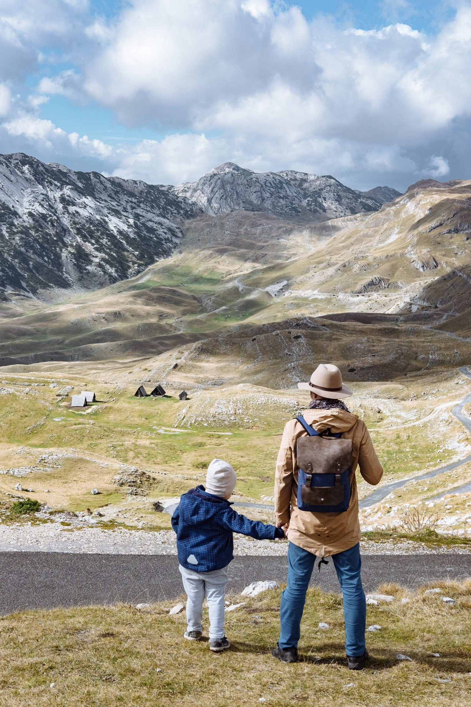 father-son travelling together in kyrgyzstan